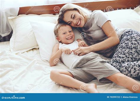 mom son share a bed